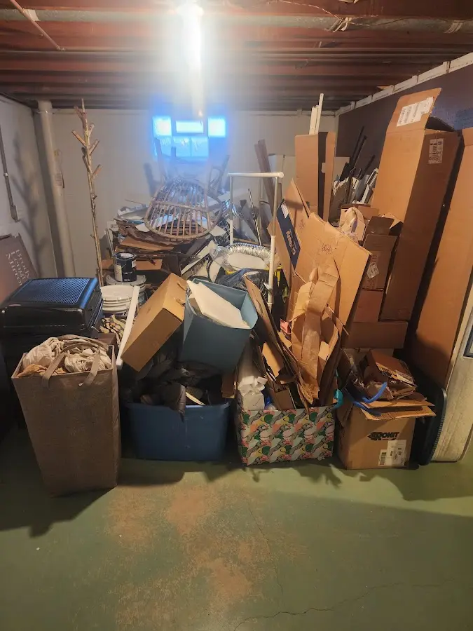 Roll-off dumpster container at job site for 2 Yard Dumpster Rental in Sumter